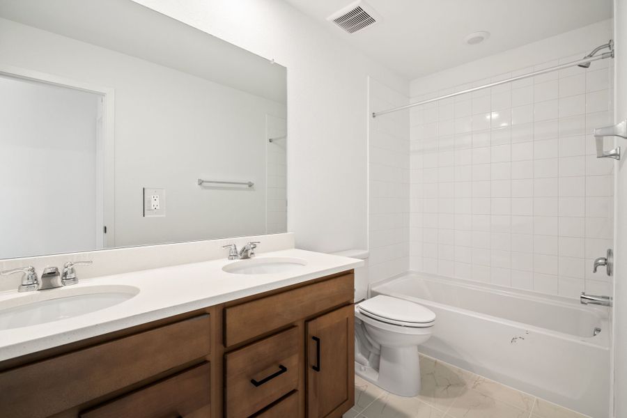 Furnished interior view inside a new home in Cordovan, Firestone (Image 4).