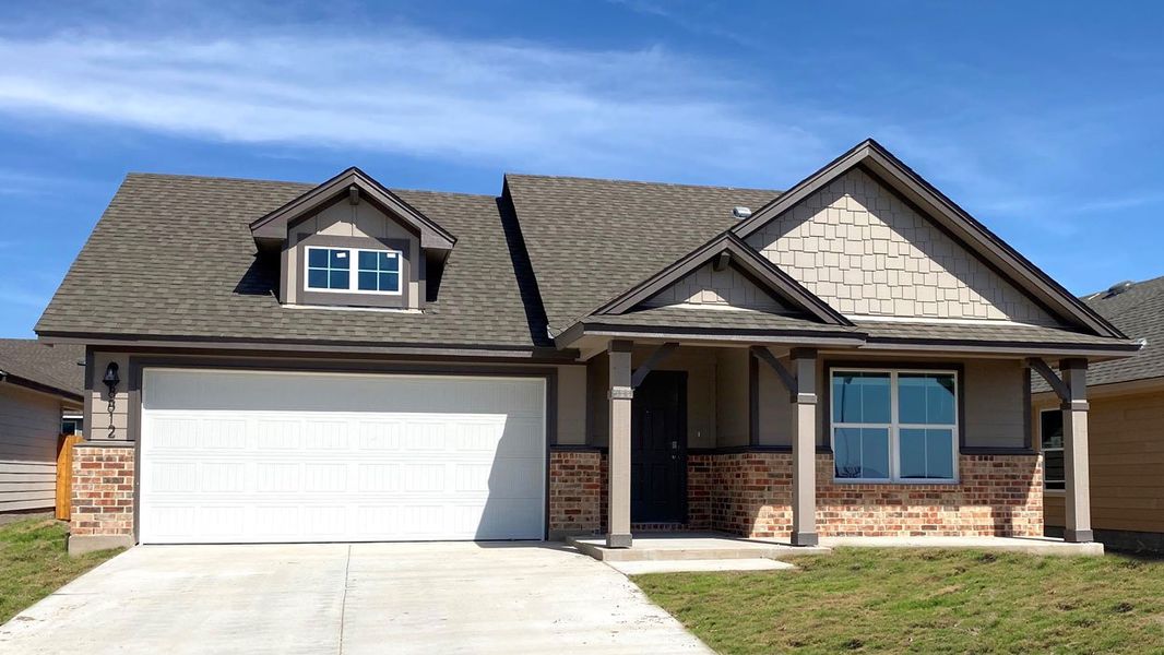 Front exterior of a new home in Mesa Ridge, Temple, TX, highlighting curb appeal (Image 2). Front exterior of a new home in Mesa Ridge, Temple, TX, highlighting curb appeal (Image 2).