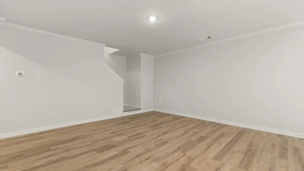 Spacious, unfurnished interior of a new home in Waypoint, Flowery Branch (Image 15).