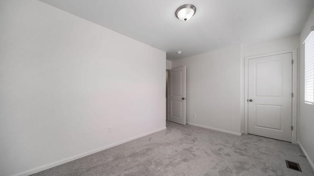 Spacious, unfurnished interior of a new home in Banning Lewis Ranch, Colorado Springs (Image 15).