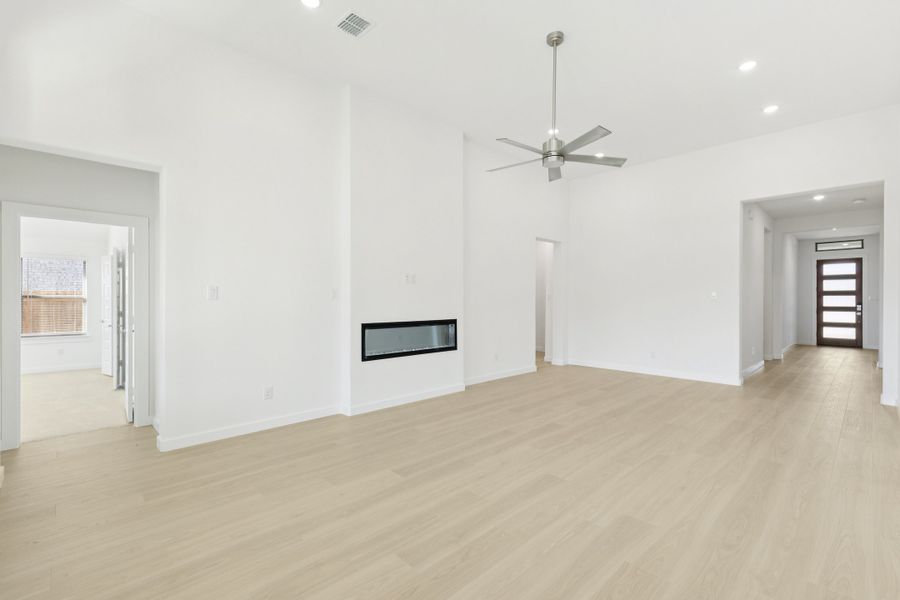 Living Room in the Gilmour II home plan by Trophy Signature Homes – REPRESENTATIVE PHOTO