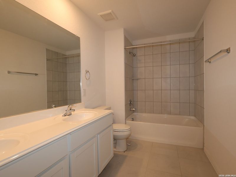 Furnished interior view inside a new home in Agave, San Antonio (Image 12).