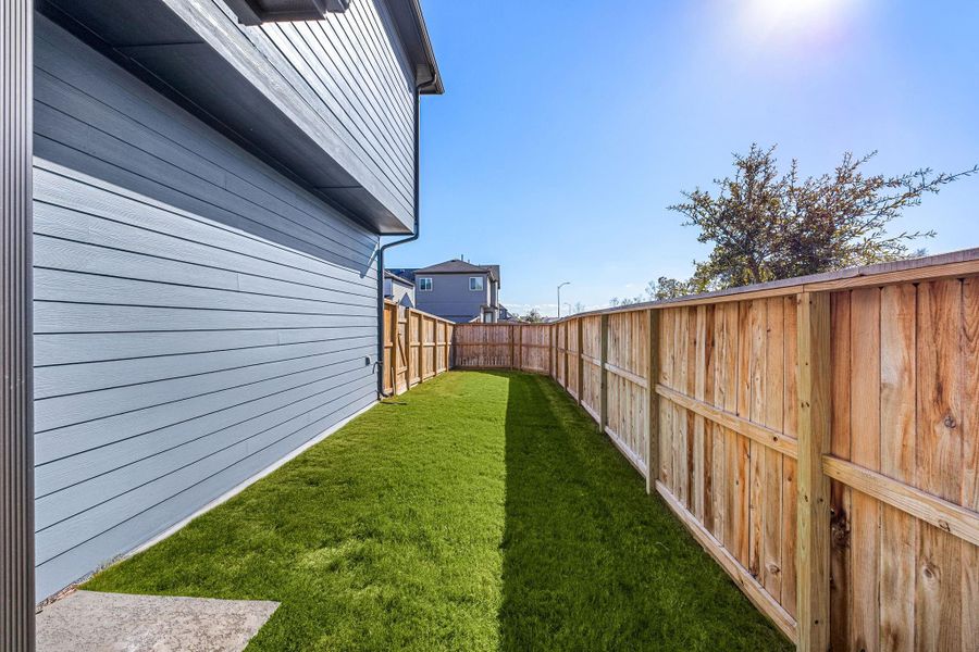 Exterior details and patio area of a home in , Humble (Image 3). Exterior details and patio area of a home in , Humble (Image 3).