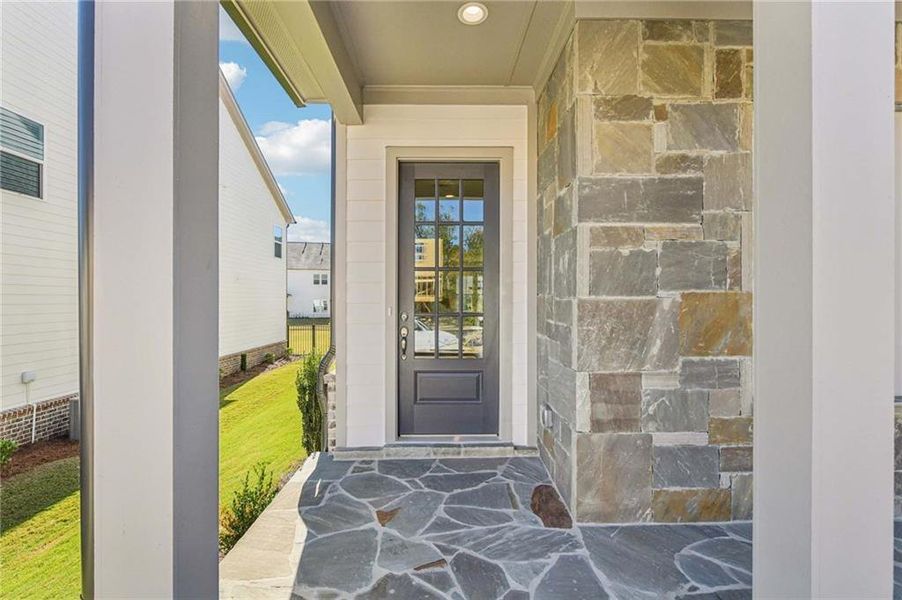 Exterior details and patio area of a home in East Harbor II at Chestatee, Dawsonville (Image 22).
