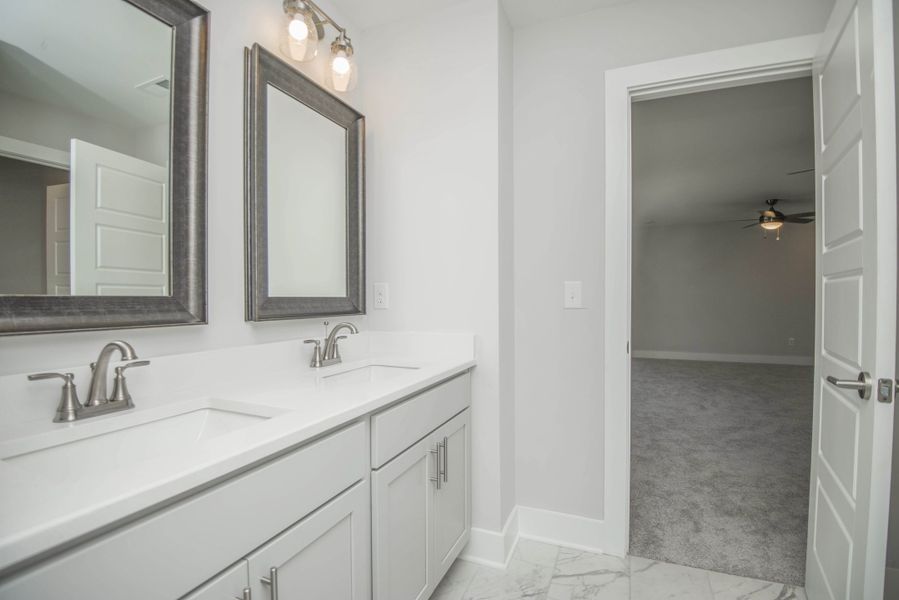 *Photo of example home. Selections and Finishes May Vary.* *Photo of example home. Selections and Finishes May Vary.*