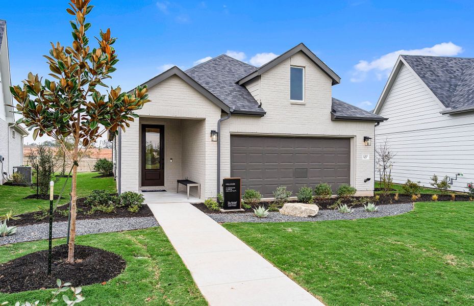 Representative exterior photo of a completed home built from the Hallmark by Del Webb in Del Webb Austin at Lost Pines, Bastrop, TX (Image 33).