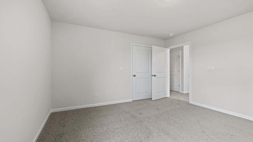 Spacious, unfurnished interior of a new home in Village Grove, Greenville (Image 23).