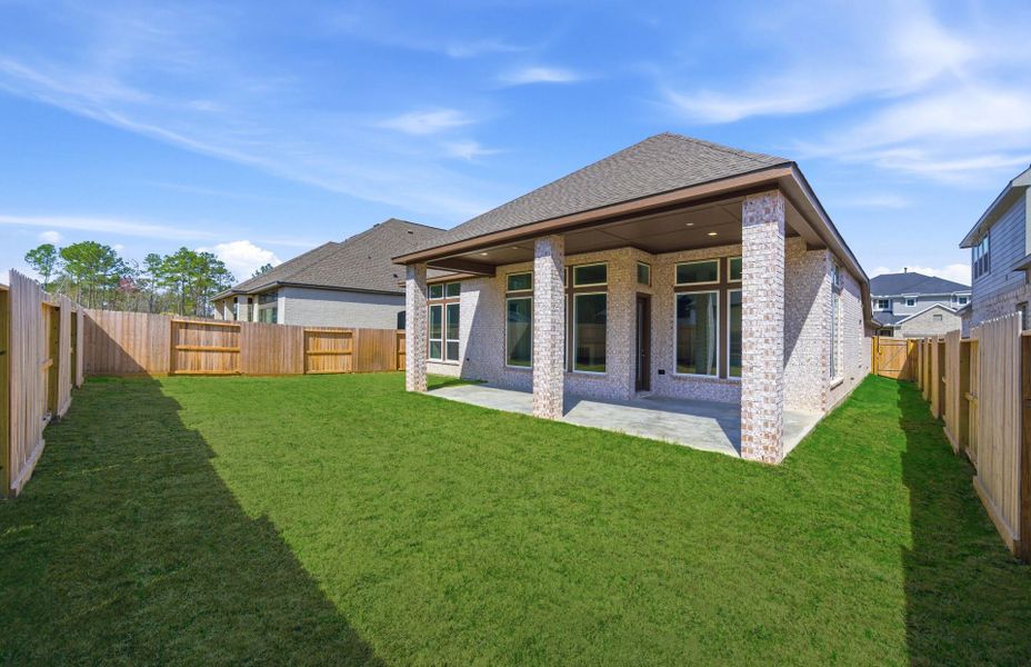 Exterior details and patio area of a home in The Highlands 55′, Porter (Image 24).