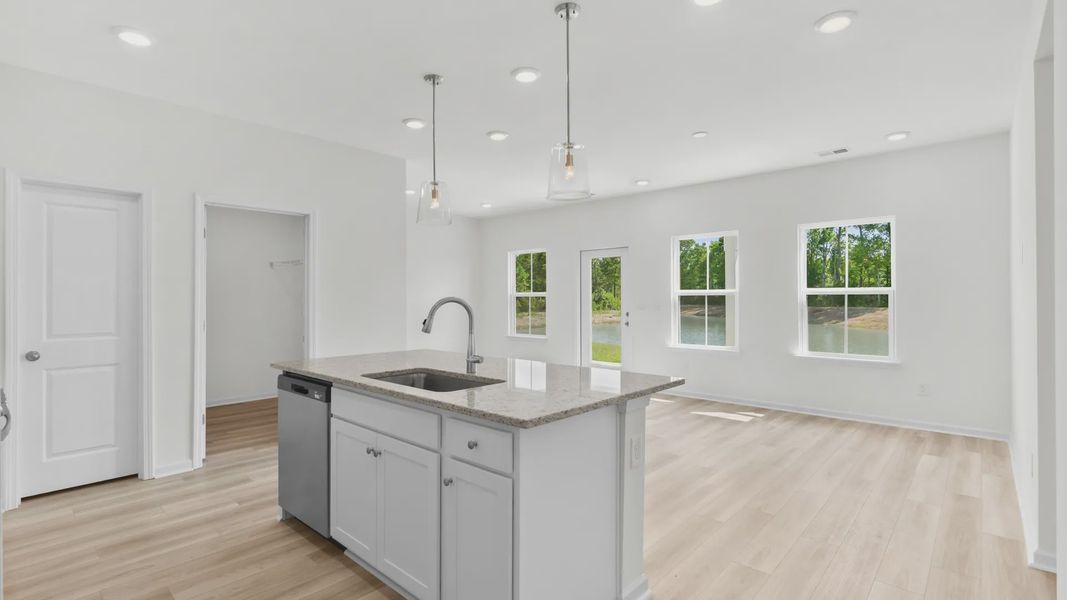 Furnished interior view inside a new home in Bluffs at Sun Colony, Longs (Image 5).