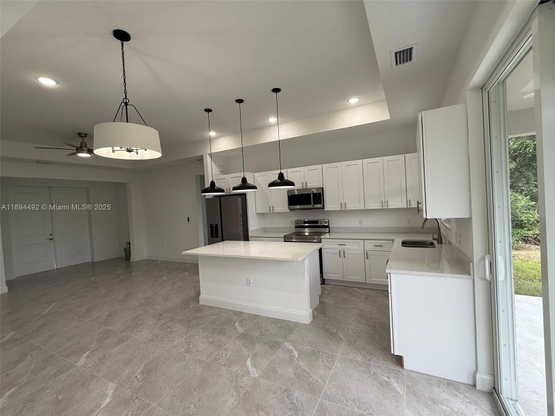 Furnished interior view inside a new home in , Lehigh Acres (Image 5). Furnished interior view inside a new home in , Lehigh Acres (Image 5).