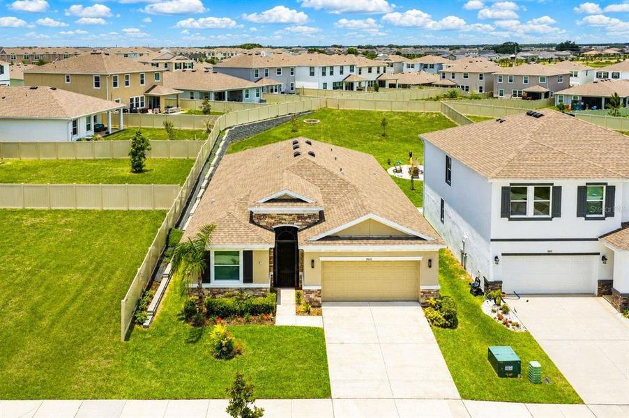 Front exterior of a new home in Epperson, Wesley Chapel, FL, highlighting curb appeal (Image 28). Front exterior of a new home in Epperson, Wesley Chapel, FL, highlighting curb appeal (Image 28).