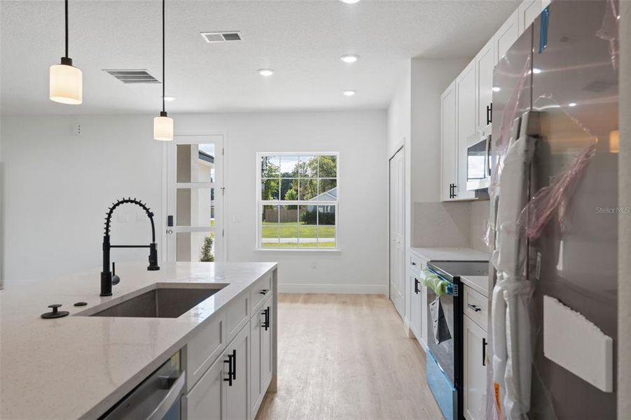 Furnished interior view inside a new home in , Ocala (Image 5). Furnished interior view inside a new home in , Ocala (Image 5).