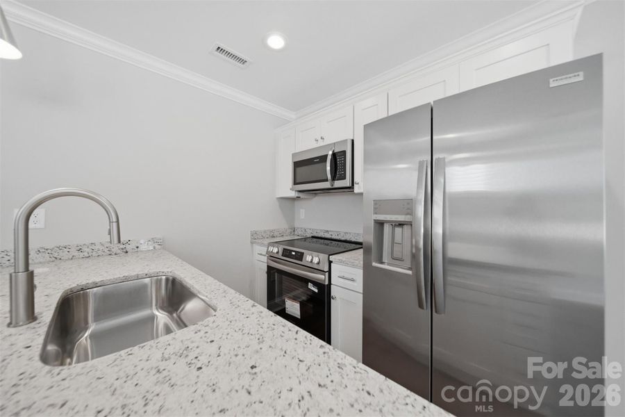 Furnished interior view inside a new home in , Hickory (Image 11).