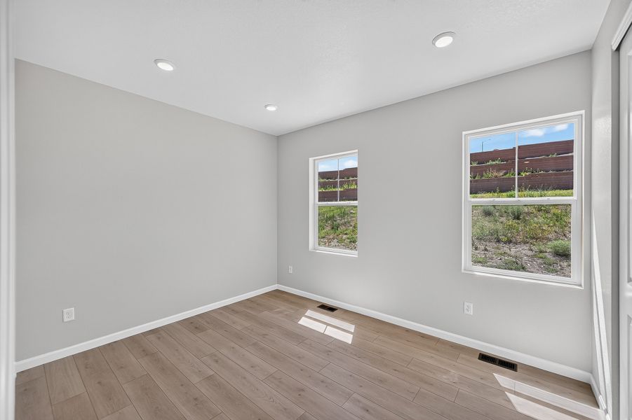 Spacious, unfurnished interior of a new home in Trailstone, Arvada (Image 22).