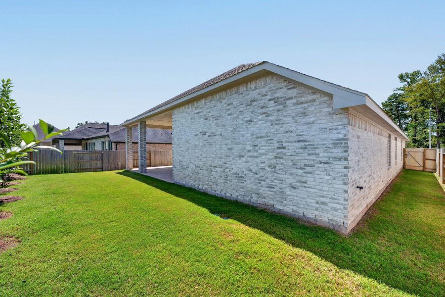 Exterior details and patio area of a home in Audubon 60′, Magnolia (Image 32).