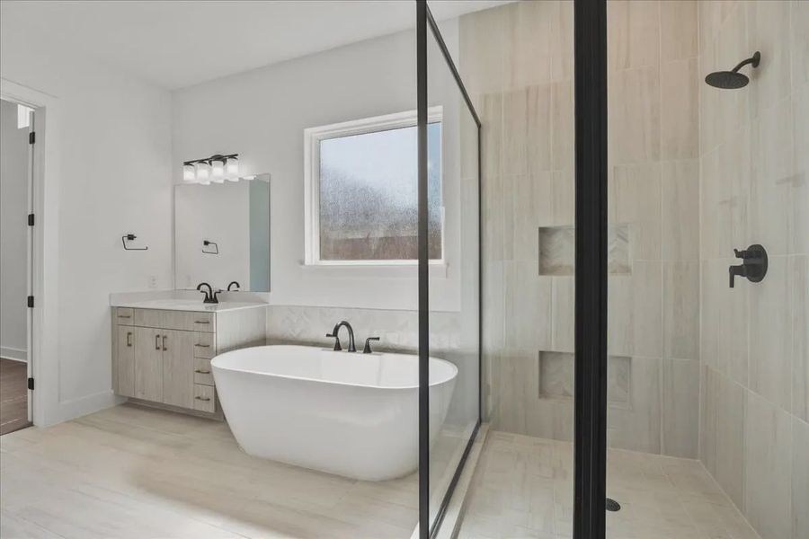 Representative furnished interior of a home built from the Courtney by Chesmar Homes in 6 Creeks, Kyle (Image 7).