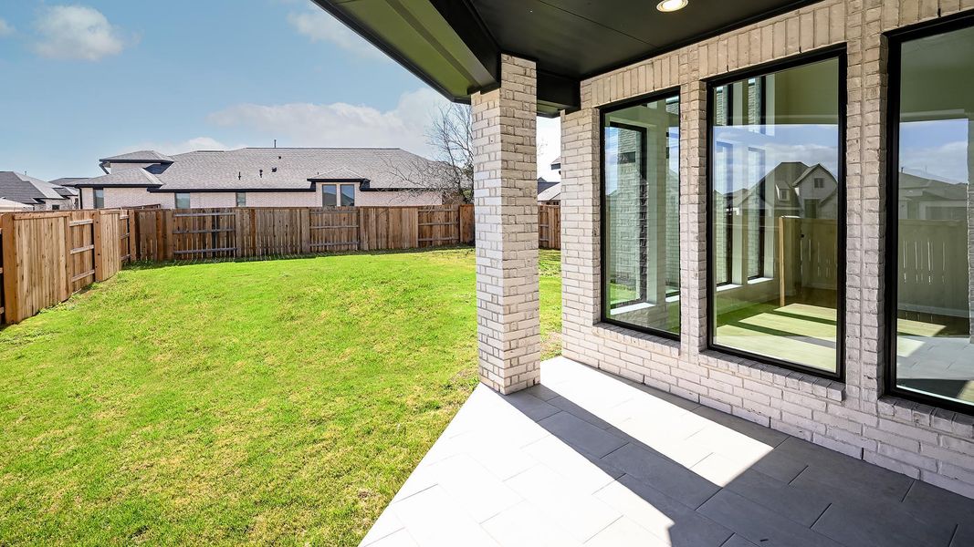Exterior details and patio area of a home in 6 Creeks, Kyle (Image 4).
