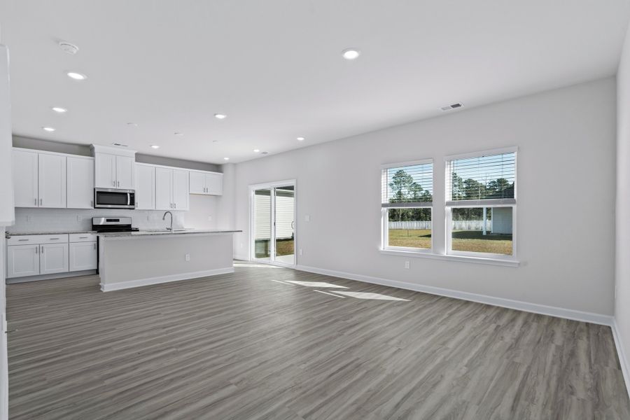 The open-concept floorplan allows for easy entertaining. The open-concept floorplan allows for easy entertaining.