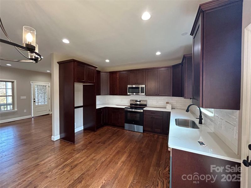 Furnished interior view inside a new home in , Newton (Image 6).