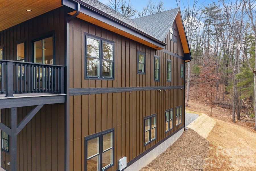 Exterior details and patio area of a home in , Asheville (Image 29).