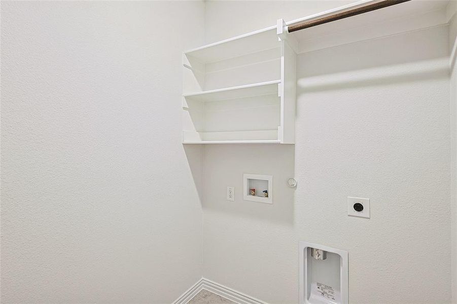 Laundry area featuring gas dryer hookup, hookup for a washing machine, and hookup for an electric dryer