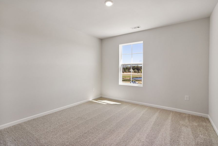 Spacious, unfurnished interior of a new home in Cambridge Reserve, Angier (Image 31).