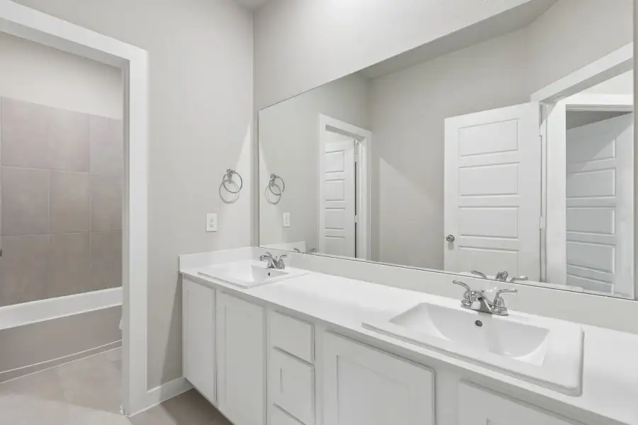 Bathroom in the Winters home plan by Trophy Signature Homes – REPRESENTATIVE PHOTO