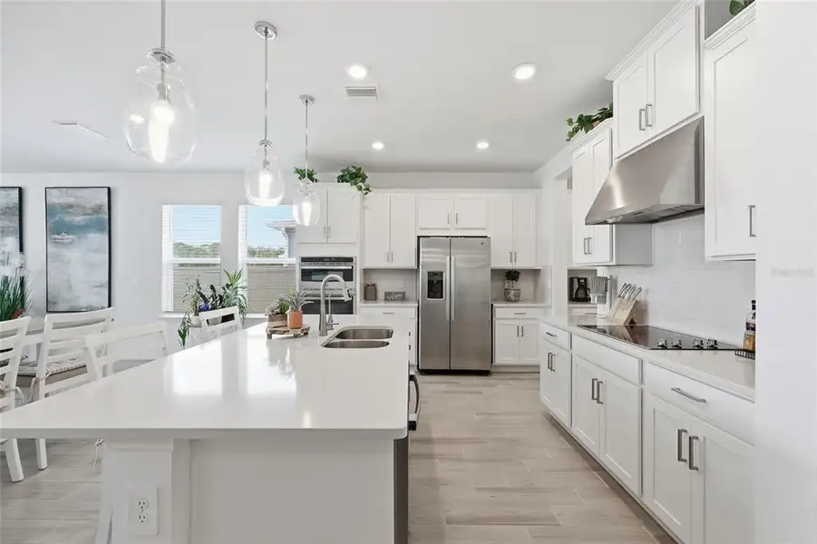 Furnished interior view inside a new home in Westview Community Group Page, Kissimmee (Image 8).
