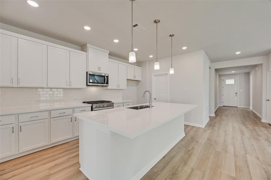 Furnished interior view inside a new home in Villages of Hurricane Creek, Anna (Image 7). Furnished interior view inside a new home in Villages of Hurricane Creek, Anna (Image 7).