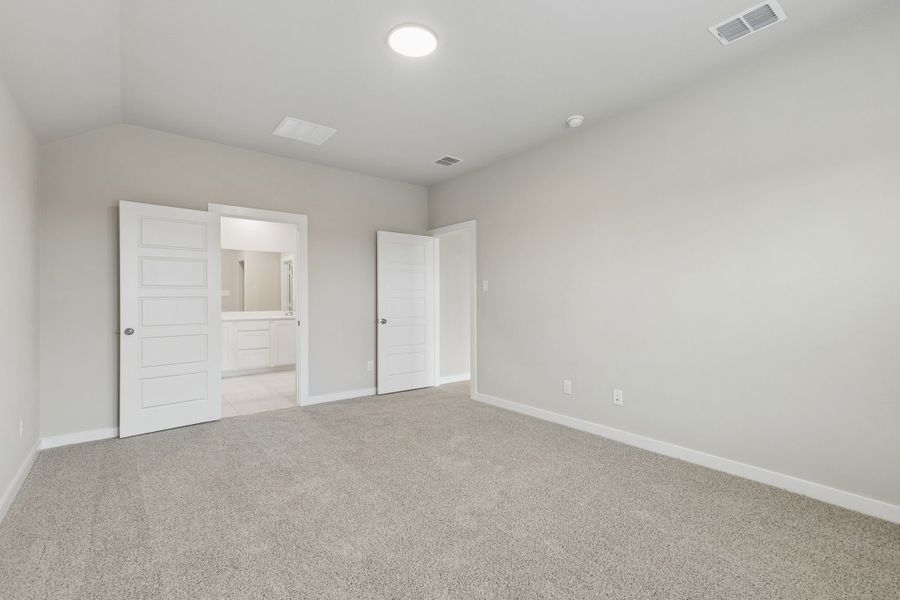 Primary Suite in the Emmy II home plan by Trophy Signature Homes - REPRESENTATIVE PHOTO