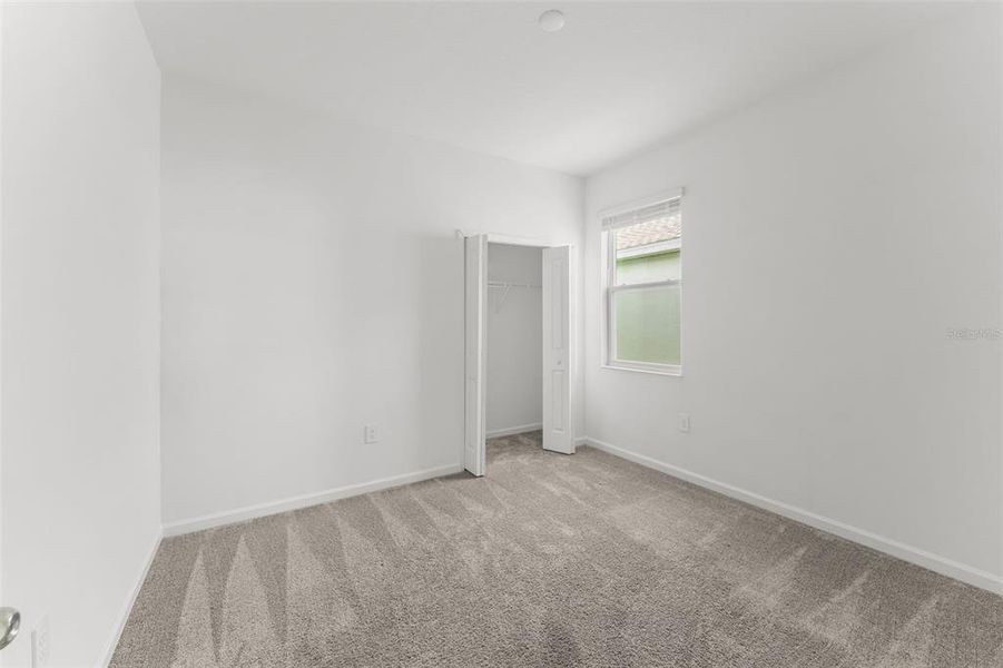 Spacious, unfurnished interior of a new home in Peace Creek Reserve, Winter Haven (Image 19).
