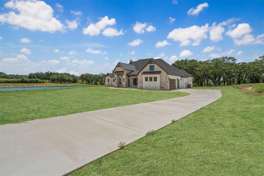 Front exterior of a new home in , Weatherford, TX, highlighting curb appeal (Image 26). Front exterior of a new home in , Weatherford, TX, highlighting curb appeal (Image 26).