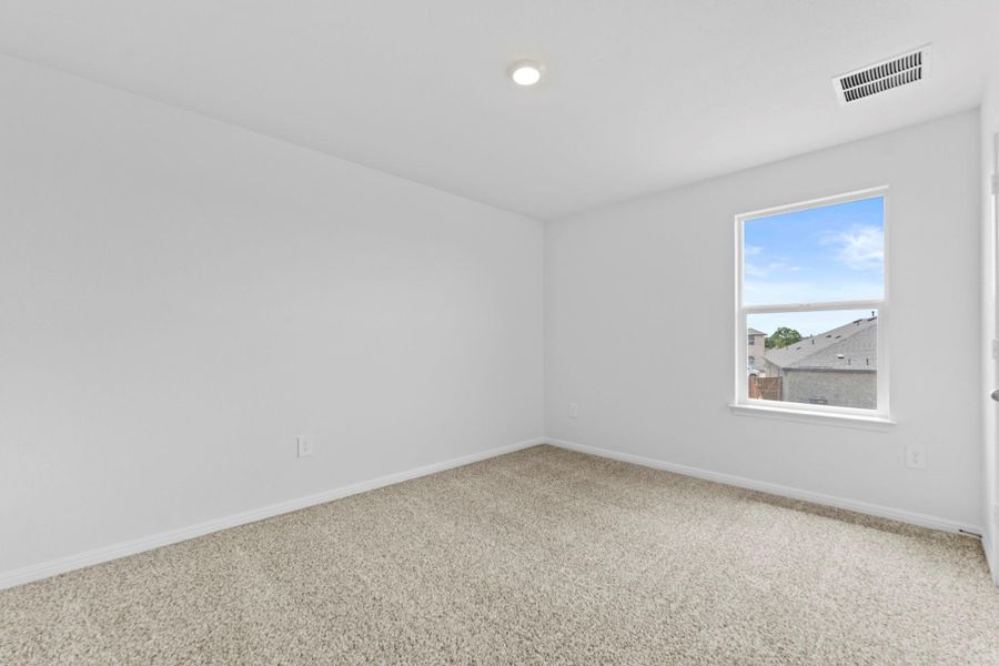 Spacious, unfurnished interior of a new home in Bar W Ranch, Leander (Image 29).