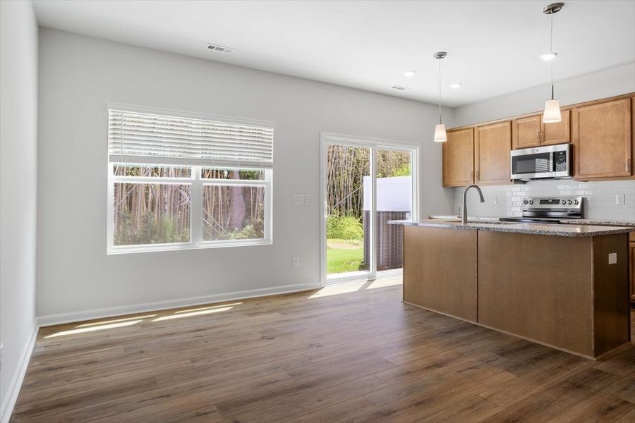 Furnished interior view inside a new home in West Main Townhomes, Sanford (Image 6).
