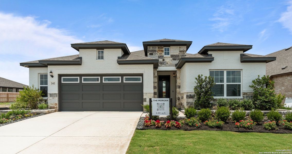 Front exterior of a new home in Stillwater Ranch, San Antonio, TX, highlighting curb appeal (Image 2).