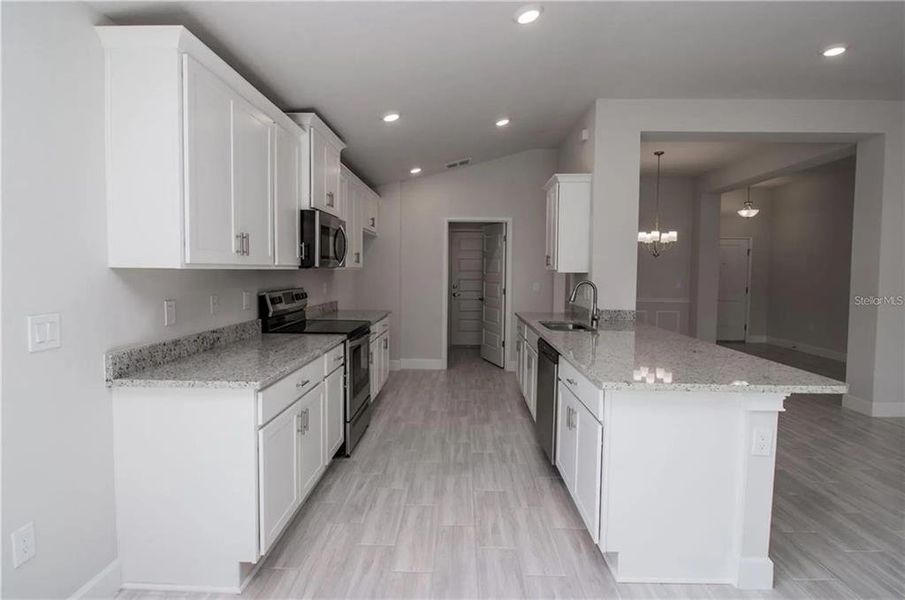 Furnished interior view inside a new home in Kirkland Farms, Alachua (Image 3). Furnished interior view inside a new home in Kirkland Farms, Alachua (Image 3).