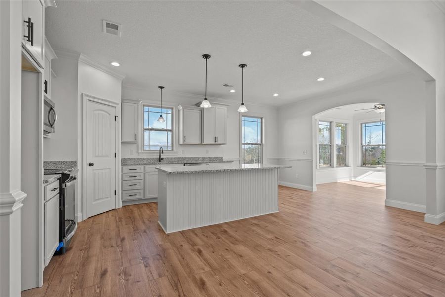 Representative furnished interior of a home built from the Converse by Enchanted Homes in Lonesome Dove, San Antonio (Image 8).