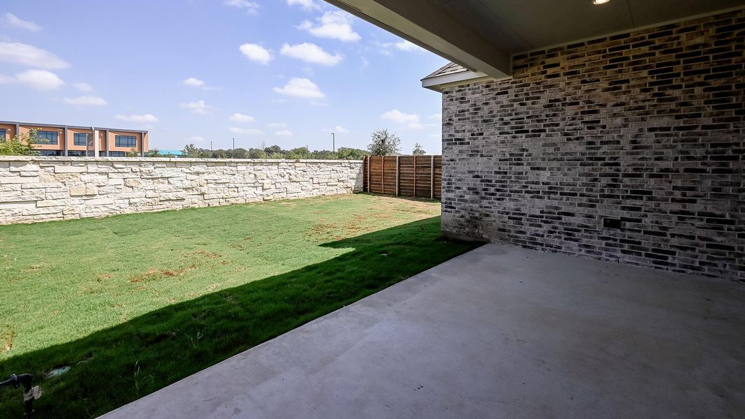 Exterior details and patio area of a home in Juniper Springs, Lockhart (Image 3).