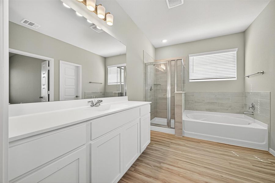 Furnished interior view inside a new home in Sunterra, Katy (Image 16).