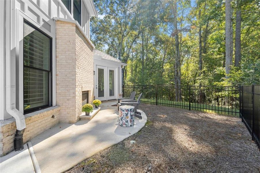 Exterior details and patio area of a home in The Courtyards by The Manor, Alpharetta (Image 3). Exterior details and patio area of a home in The Courtyards by The Manor, Alpharetta (Image 3).