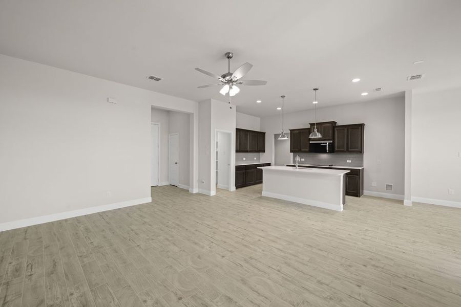 Front exterior of a new home in Still Water Lake, Godley, TX, highlighting curb appeal (Image 6). Front exterior of a new home in Still Water Lake, Godley, TX, highlighting curb appeal (Image 6).