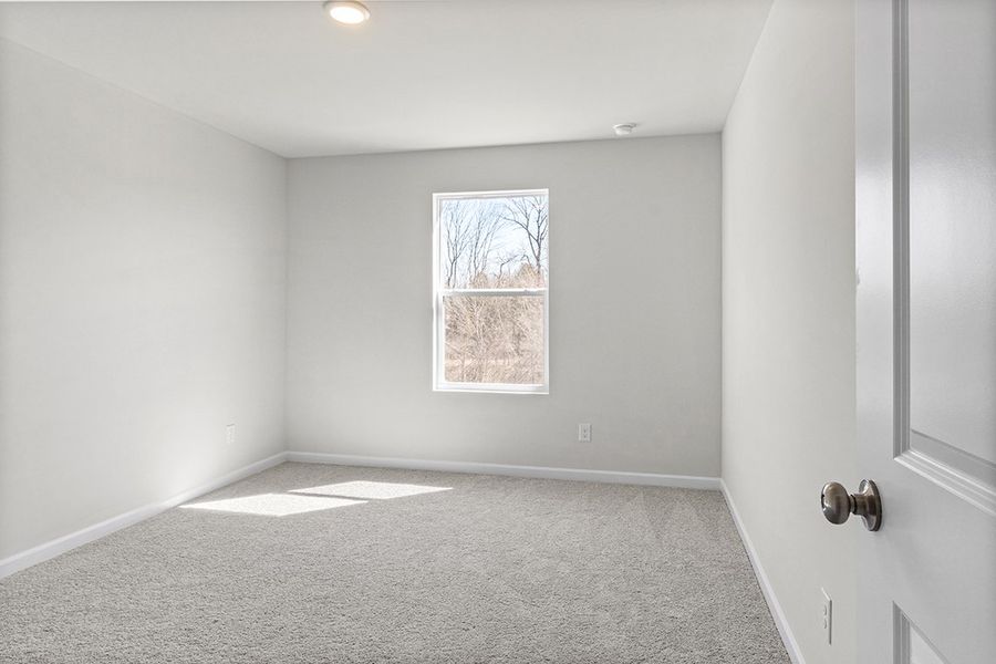 A room with a window and a door. A room with a window and a door.