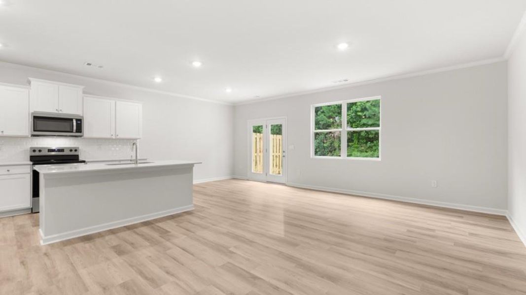 Spacious, unfurnished interior of a new home in Waypoint, Flowery Branch (Image 25).