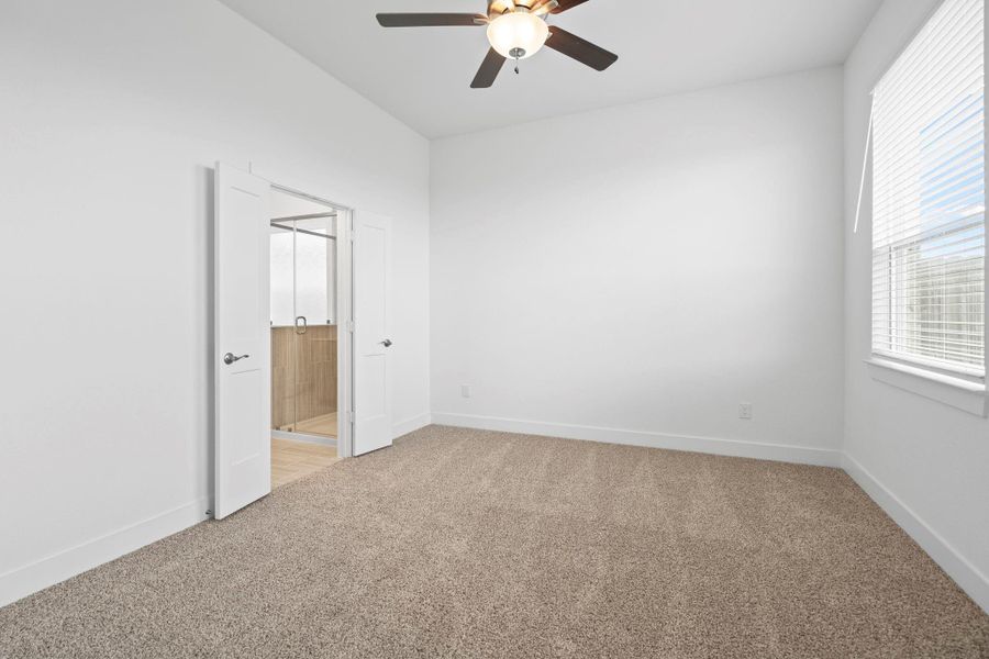 Spacious, unfurnished interior of a new home in Sunterra, Katy (Image 21).