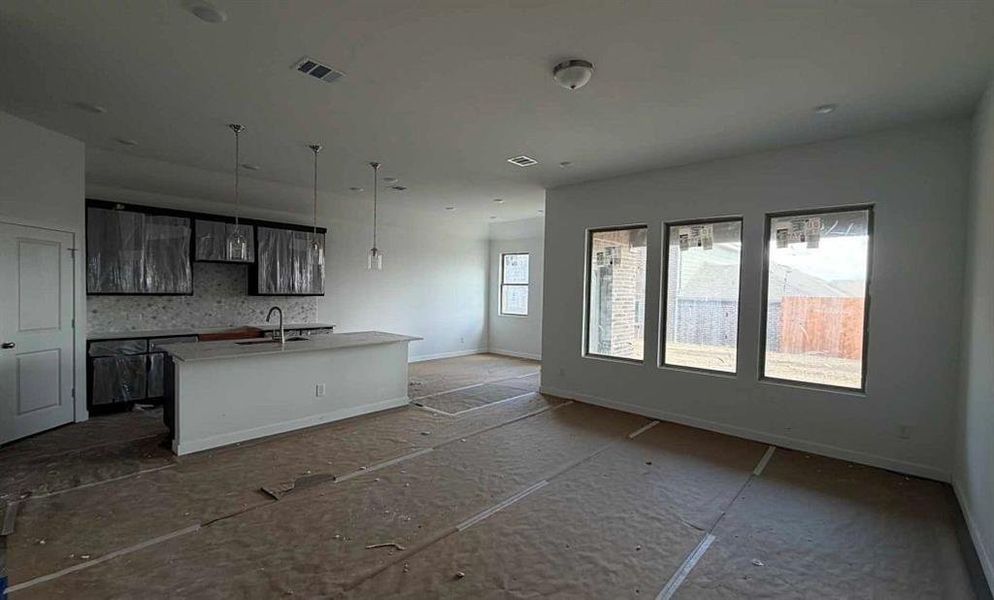 Open Kitchen-Living-Dining Room Construction Progress featuring the Roosevelt Collection Open Kitchen-Living-Dining Room Construction Progress featuring the Roosevelt Collection