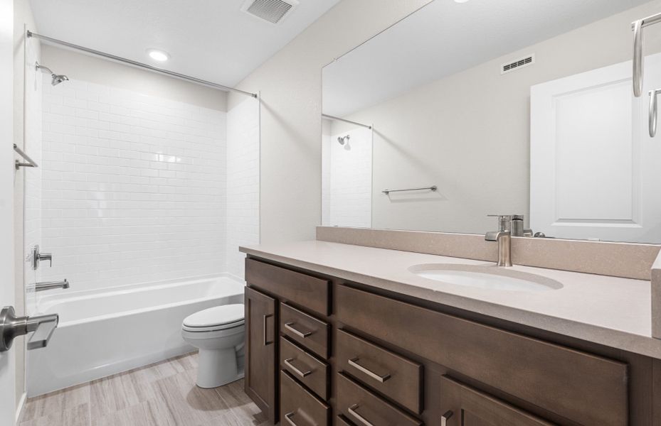 Furnished interior view inside a new home in Harvest Crossing, Aurora (Image 4).