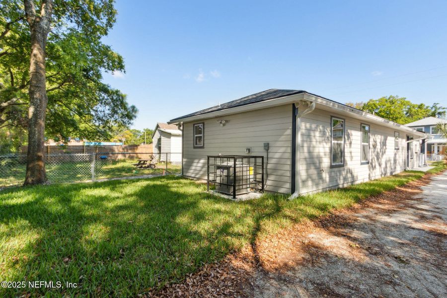 Front exterior of a new home in , Jacksonville, FL, highlighting curb appeal (Image 2).