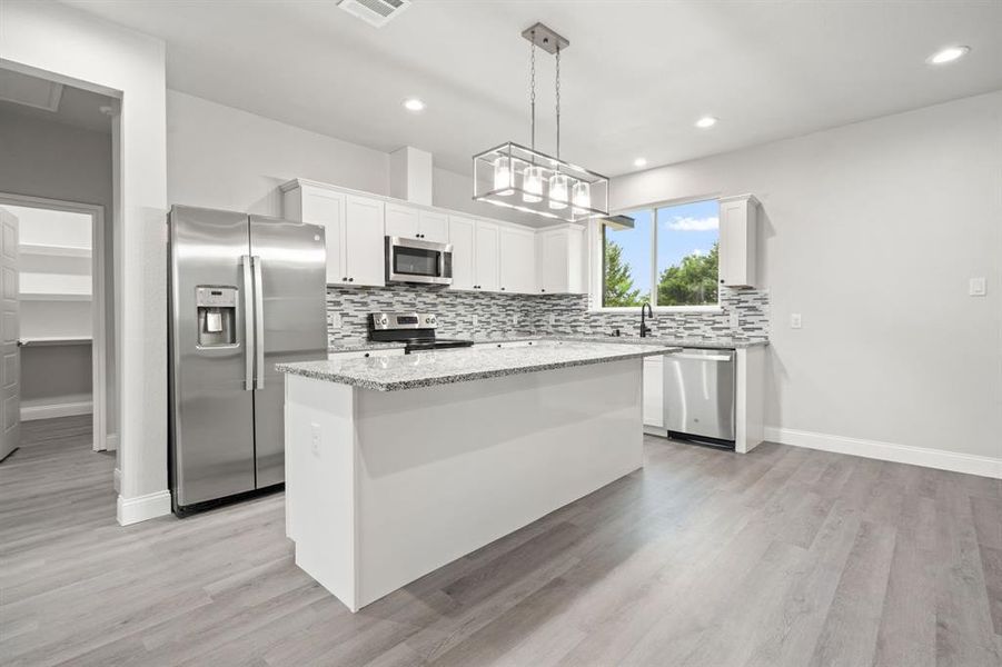 Furnished interior view inside a new home in , Greenville (Image 7).