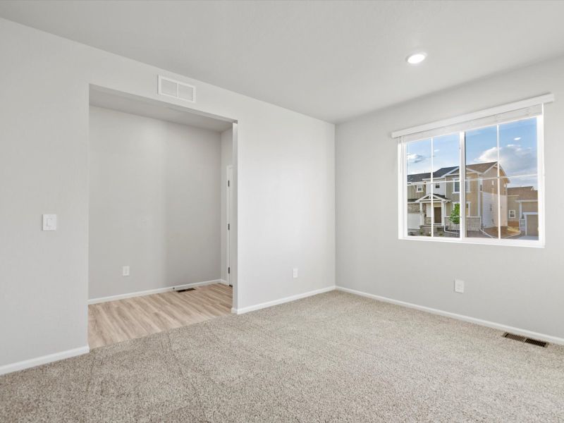 Spacious, unfurnished interior of a new home in Poudre Heights: The Lakes Collection, Windsor (Image 12). Spacious, unfurnished interior of a new home in Poudre Heights: The Lakes Collection, Windsor (Image 12).
