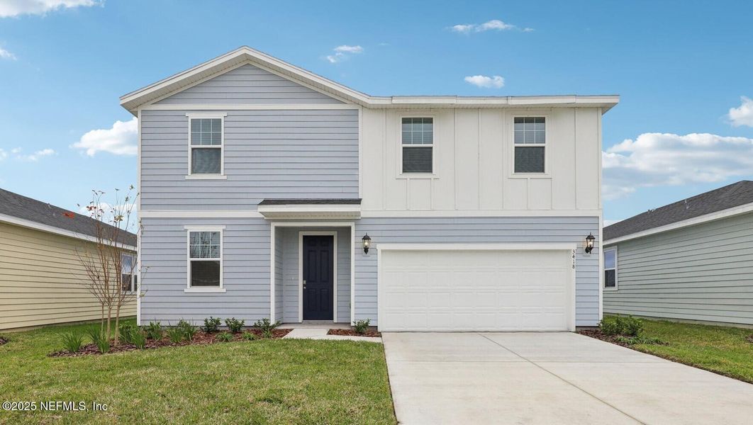 Front exterior of a new home in Lakes at Bella Lago - Signature Series, Green Cove Springs, FL, highlighting curb appeal (Image 1). Front exterior of a new home in Lakes at Bella Lago - Signature Series, Green Cove Springs, FL, highlighting curb appeal (Image 1).